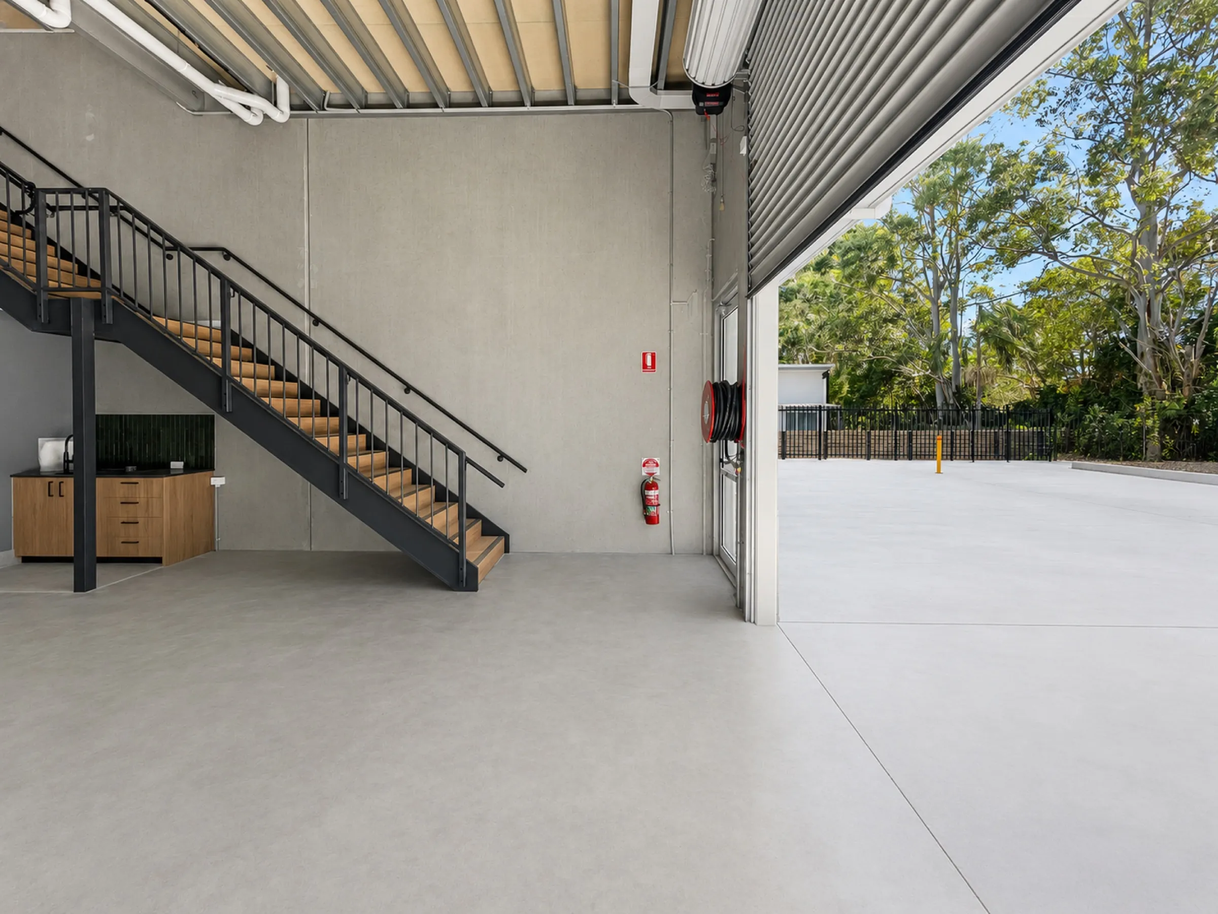 Internal drive-up unit at Boronia with roller door open to the yard.