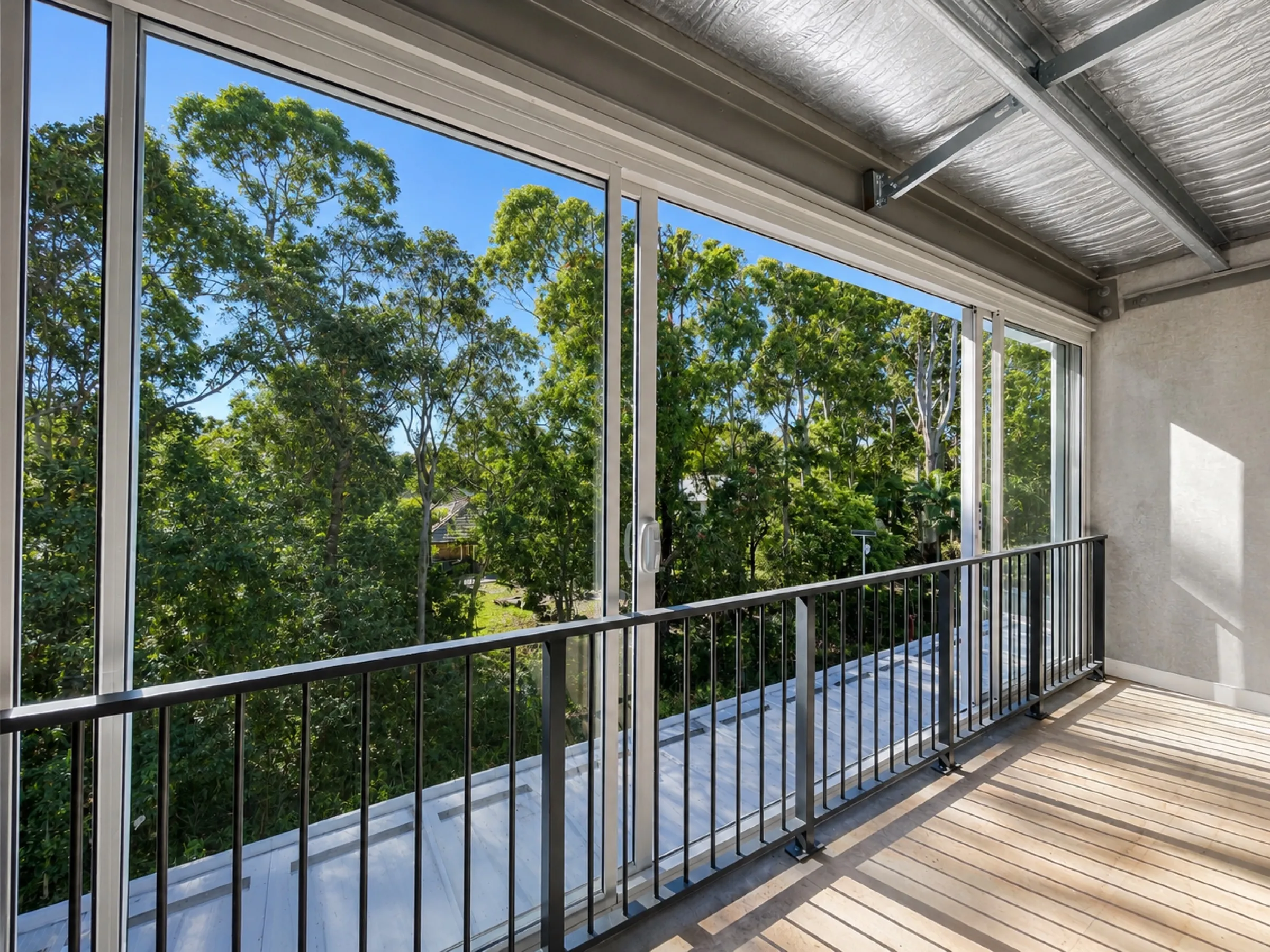 Light-filled upper-level unit at Boronia with exposed steel ceiling.