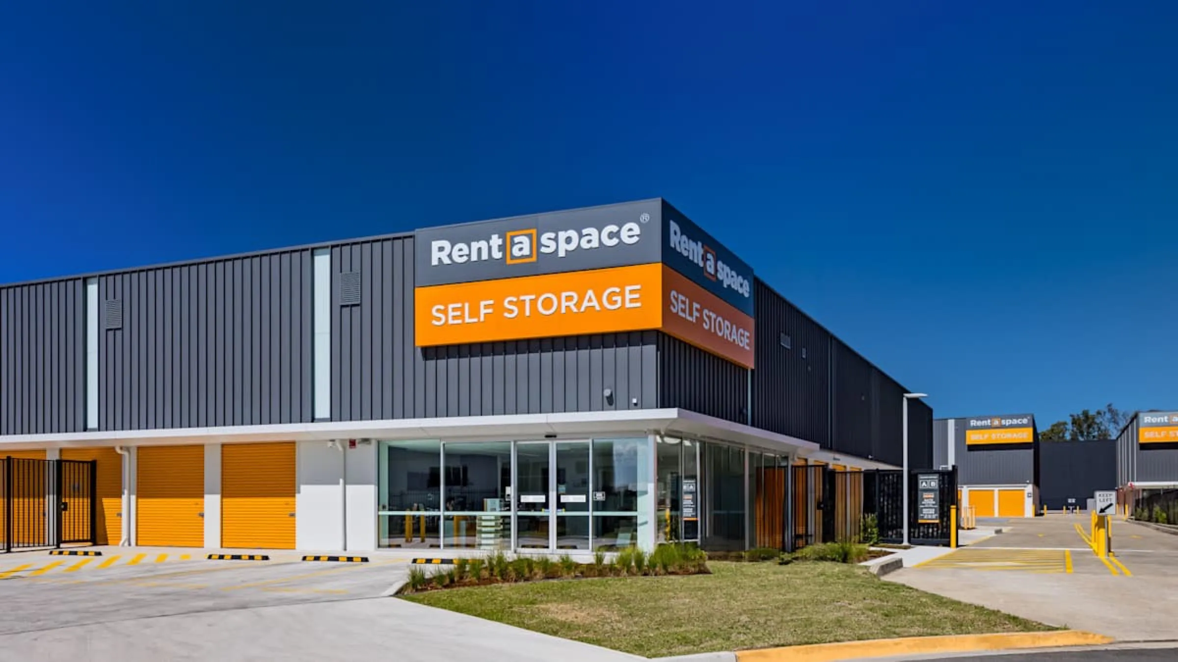 Rows of drive-up storage units with roller doors at Marsden Park.