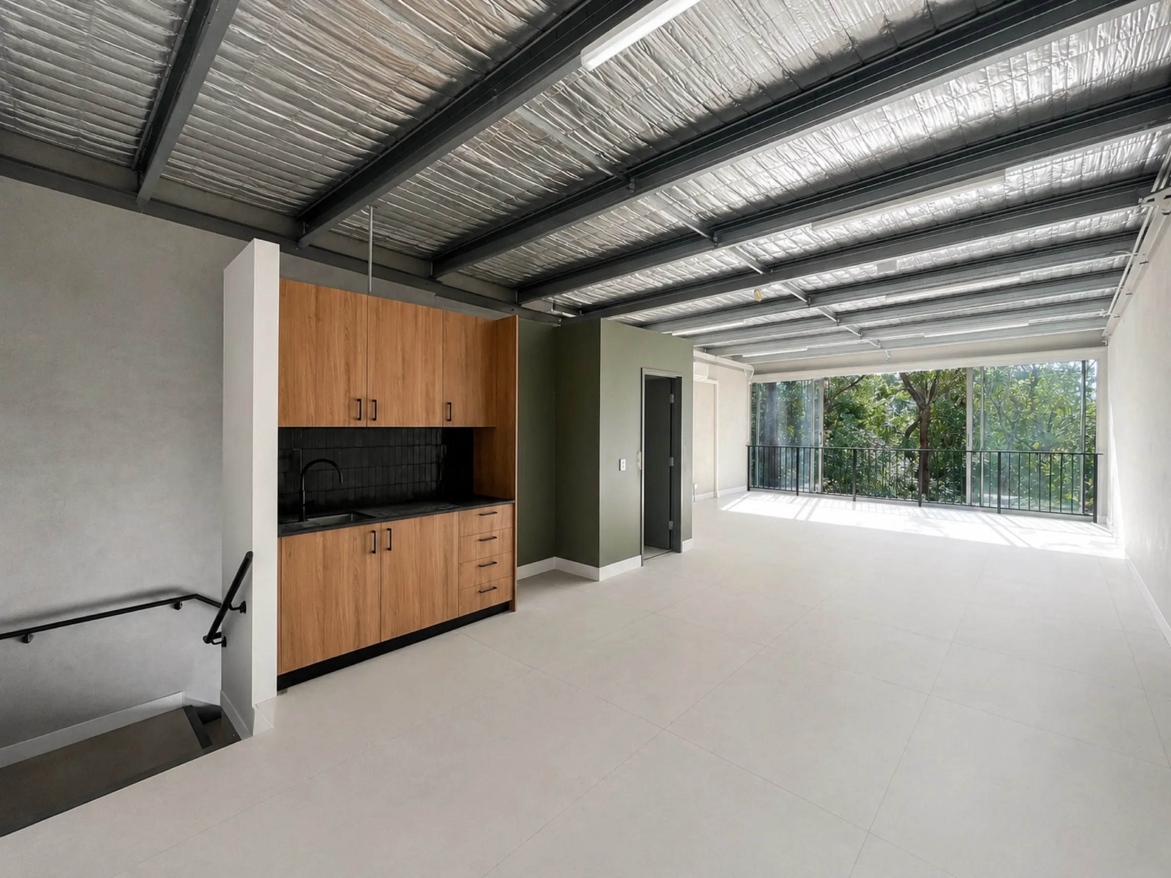 Unit interior at Boronia with kitchenette and mezzanine access.