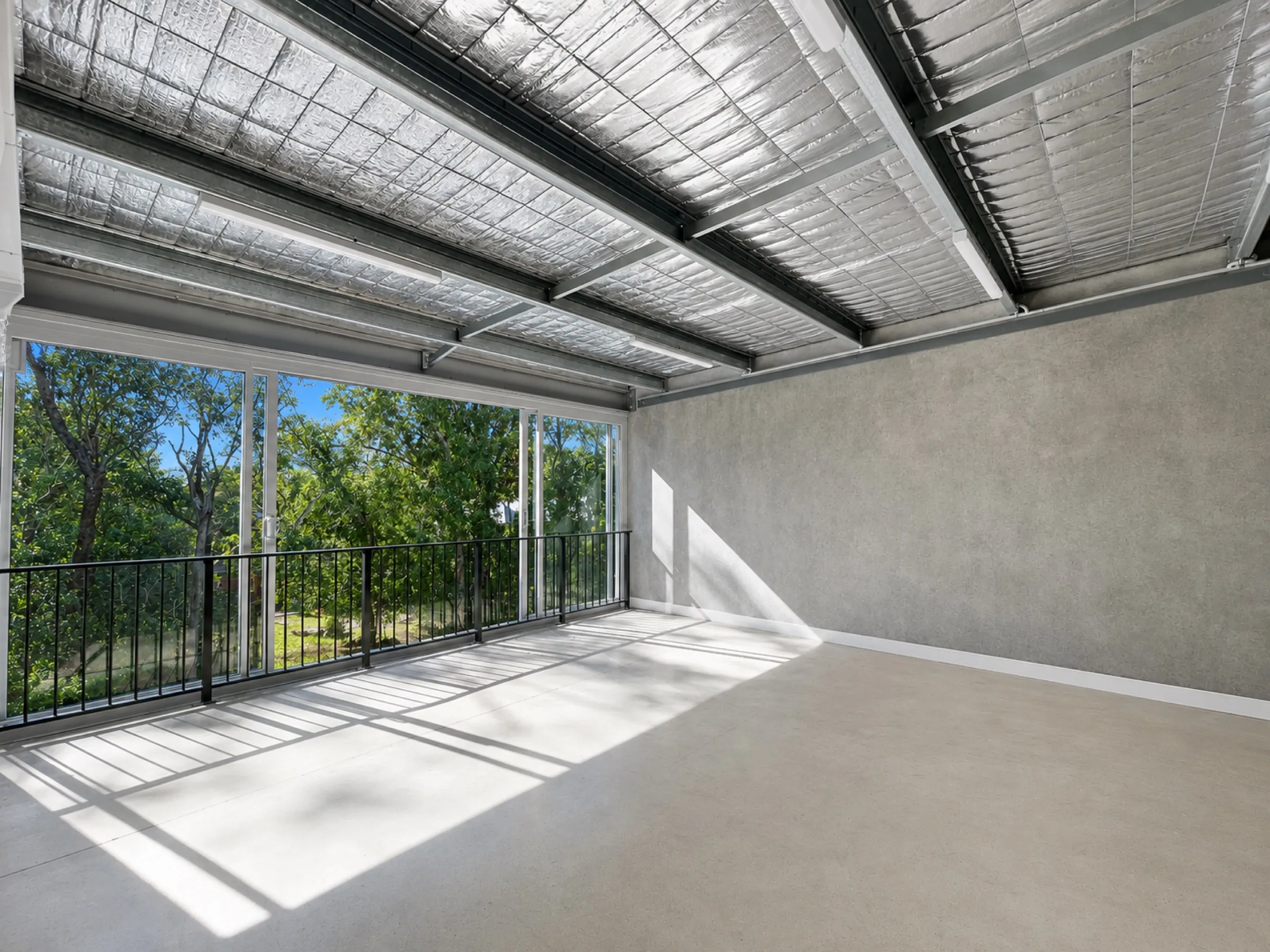 Exterior of the completed Boronia industrial units at Byron Bay, surrounded by bushland.